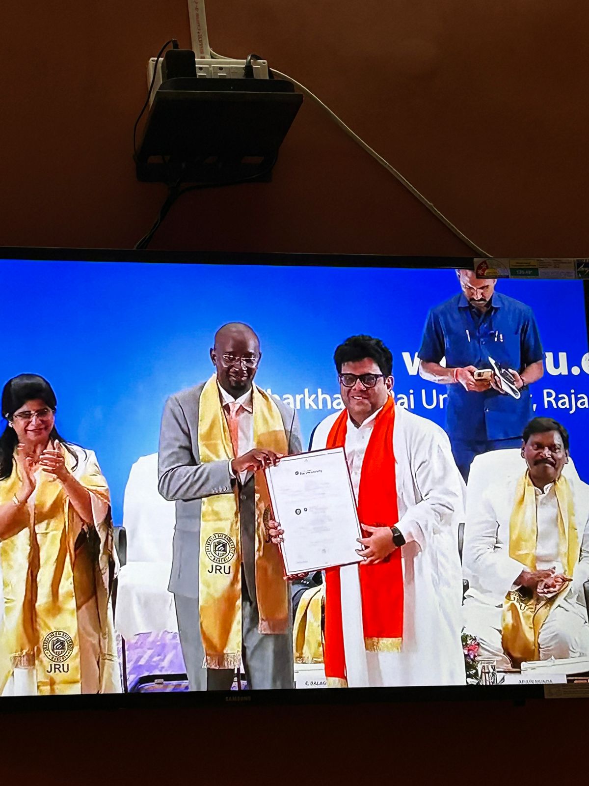 University-stage ceremony photograph