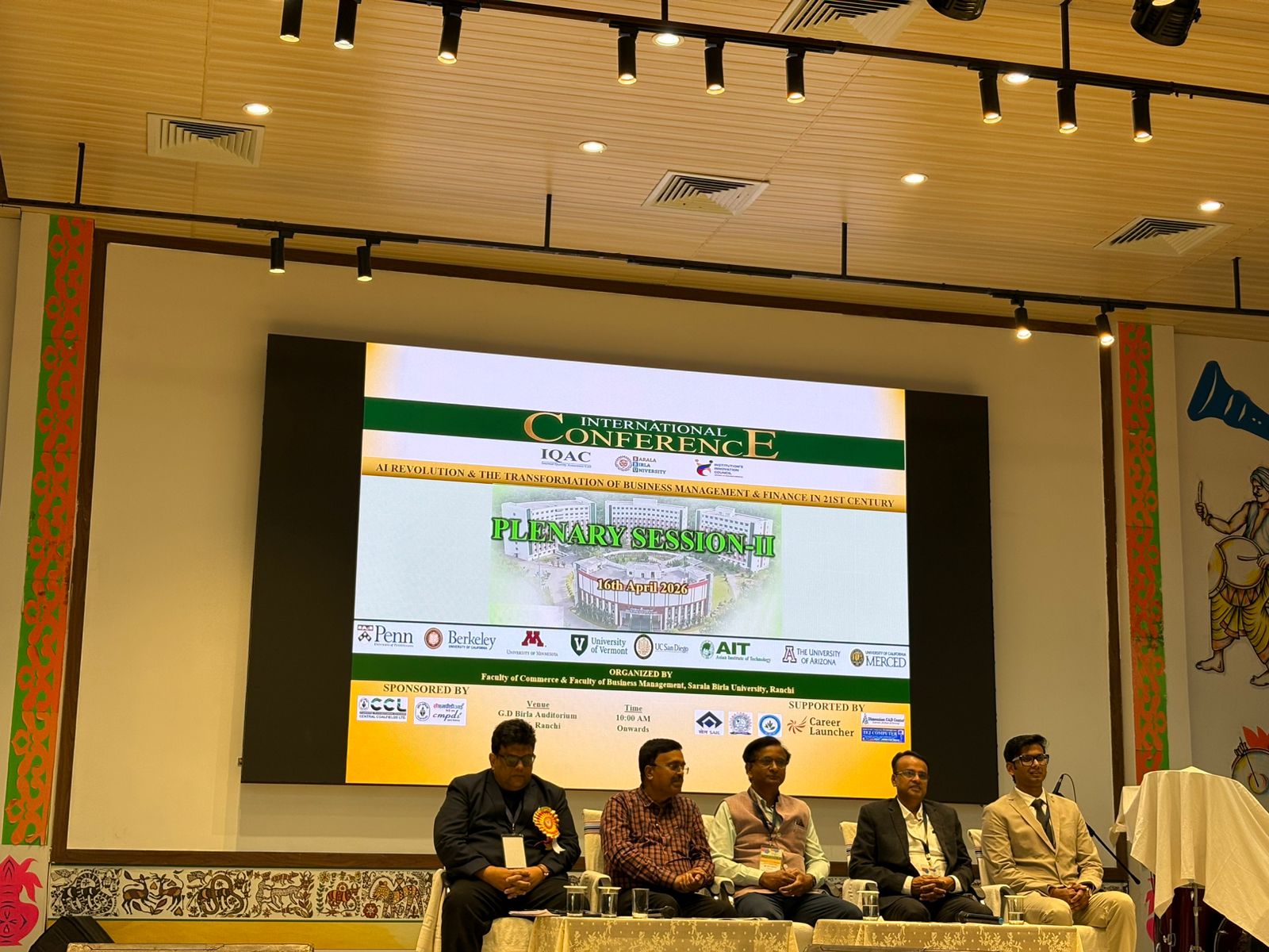Wide conference-panel photograph