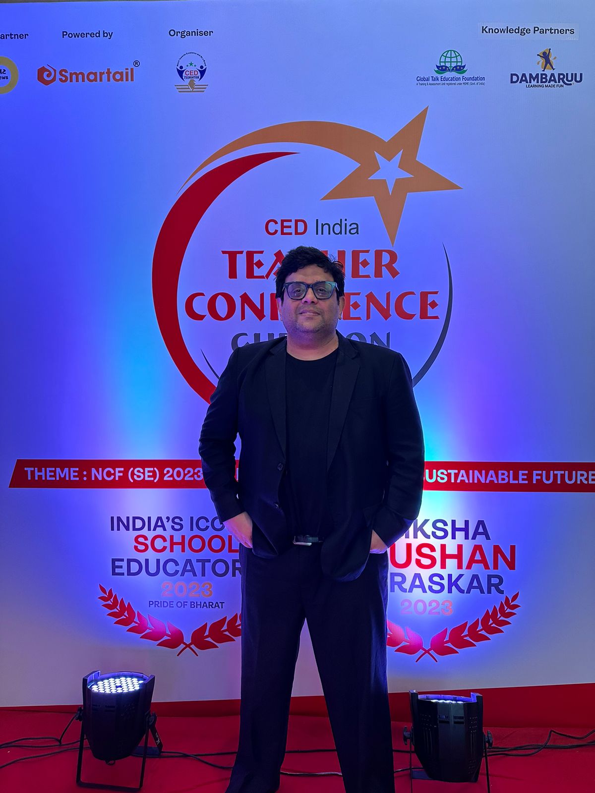 Coach Arif at a speaking event